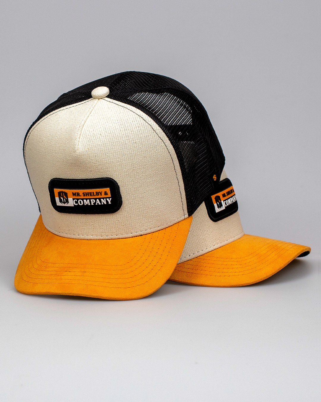 Boné Mr. Shelby Trucker Company Off White e Laranja
